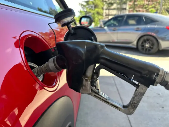 Nozzle in car gas tank