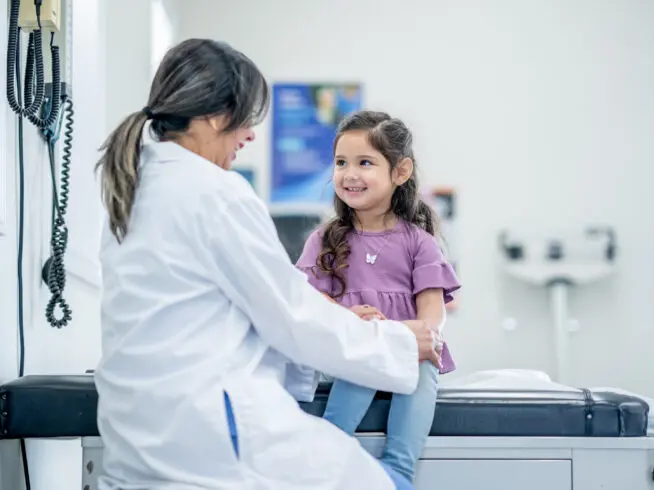 Doctor with child patient