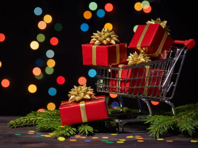 Shopping cart with gift boxes.